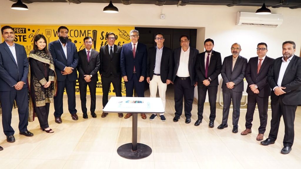 Faysal Bank and Avanza Solutions Leadership celebrating 100M transactions